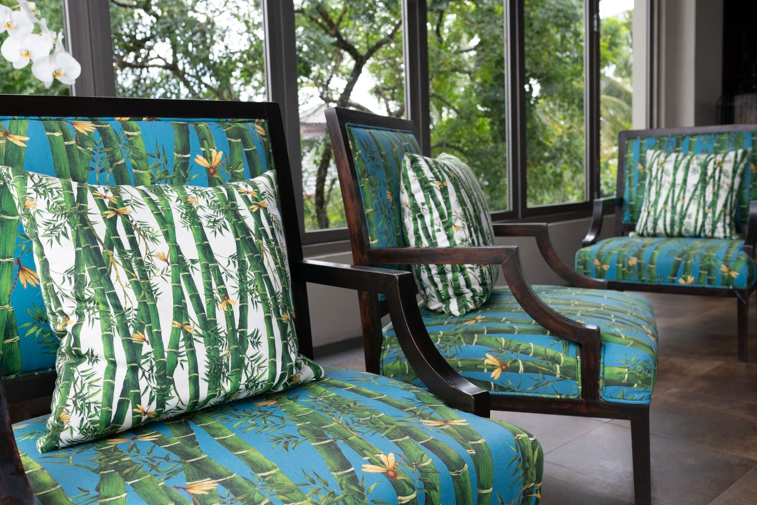 Bamboo-print upholstered chairs by SEAM Upholstery