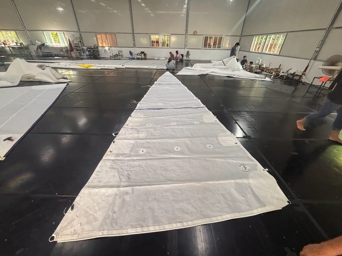 A mainsail complete on the shop floor
